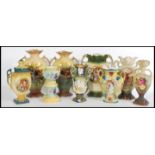 A selection of 19th century Staffordshire pairs of vases to include a pair featuring Clyde deer with