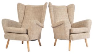 ORIGINAL 1950'S WINGED BACK ARMCHAIRS IN THE MANNER OF HOWARD KEITH