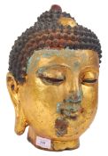 GAUTAMA BUDDHA CAST AND GILDED HEAD STATUE