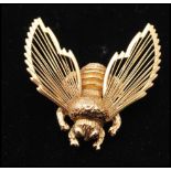 A 1970s signed Monet Bumble Bee brooch pin. Measures 1 1/2 inches.