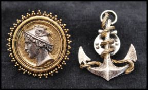 Two 1950s signed brooch scatter pins, one depicting Mercury the other on the form of an anchor.