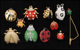 A collection of vintage Ladybird bug brooch pins to including rhinestone set, enamel, terracotta,