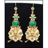 A pair of vintage signed Askew of London gold-tone figural earrings in the form of frogs set upon