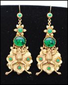 A pair of vintage signed Askew of London gold-tone figural earrings in the form of frogs set upon