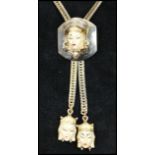 1950s Selro / Selini Asian Princess gold-tone lariat slide necklace and earring set consisting of  a