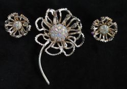 A 1960s signed Sarah Coventry Allusion 1968 gold-tone floral brooch pin and earring set, together