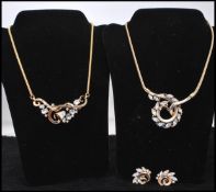A 1950s signed Trifari, Alfred Phillipe, Lucky Clover rhinestone necklace and earring set dates to