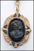 A 1930s Art Deco West German locket pendant necklace having a cameo faced locket with decorative