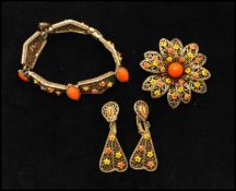 A 1950s signed Art © Arthur Pepper demi parure consisting of floral filigree design bracelet,