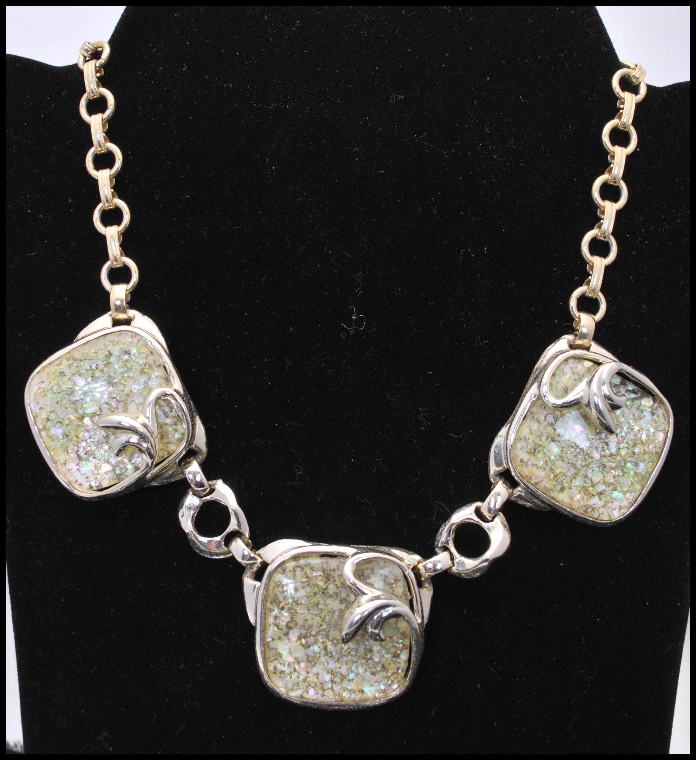 A 1950s silver-tone confetti lucite demi parure consisting of necklace earrings and bracelet. - Image 2 of 8