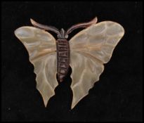 A circa late 19th century large Art Nouveau French carved horn butterfly brooch. Marked Deposé.