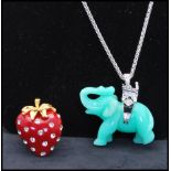 A signed Kenneth J Lane Elephant pendant necklace together with a rhinestone set ring in the form of