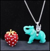 A signed Kenneth J Lane Elephant pendant necklace together with a rhinestone set ring in the form of