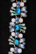 A 1950s DeLizza and Elster Juliana five link bracelet set with elaborate blue and white
