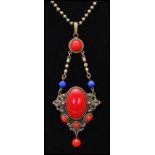 A 1930s Czech pendant necklace having red cabochons with red and blue faceted glass beads strung
