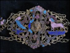 A 1920s Czech Neiger brothers Egyptian revival filigree and enamel belt decorated with enamelled