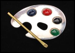 A signed Taxco Mexican silver brooch in the form of an artists pallet set with coloured cabochons TA