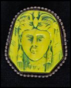 A 1920's Czech Neiger brothers Egyptian revival brooch pin set with yellow glass pharaohs head