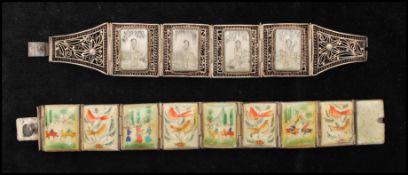 An early 20th century 8 panel Persian hand painted story bracelet together with a pierced 5 panel