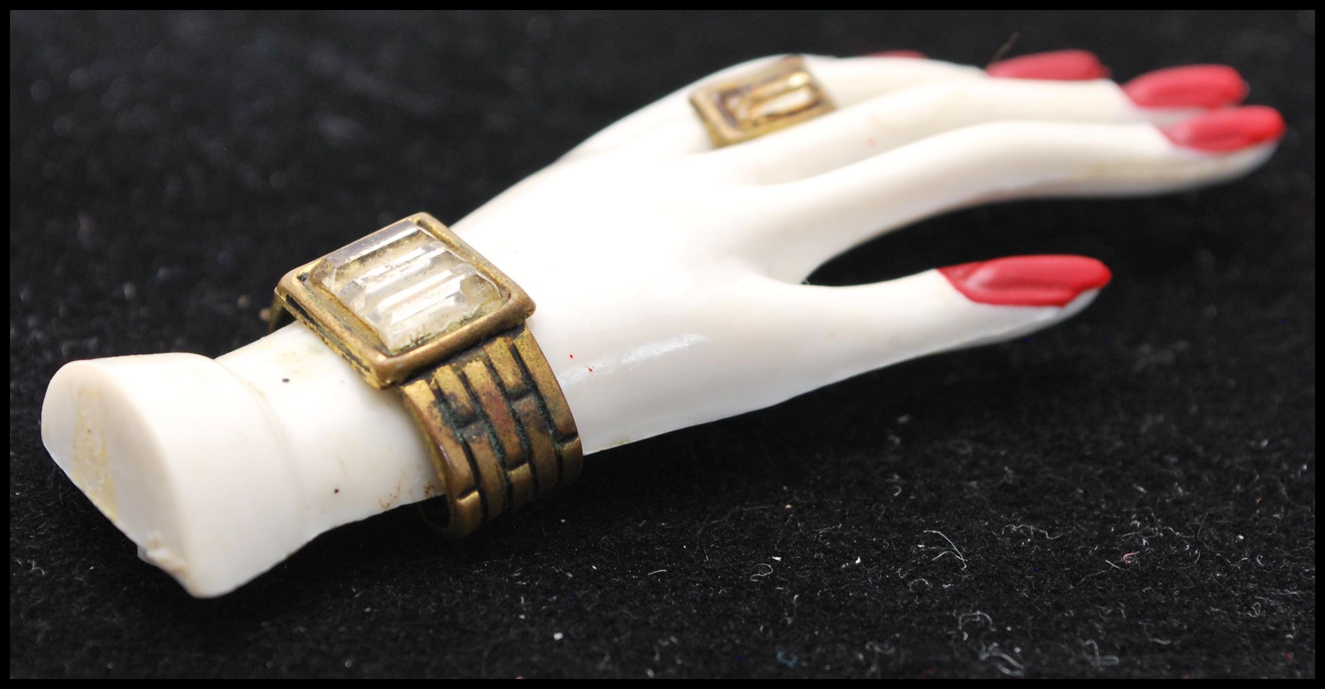 A 1930s Art Deco French celluloid brooch in the form of a graceful hand set with jewellery, paste - Image 3 of 3