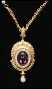 A vintage limited edition signed Edgar Berebi Mata Hari 1916 gold-tone locket pendant twin strand