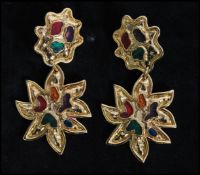 A pair of vintage signed Edouard Rambaud gold tone oversized dahlia style earrings decorated with