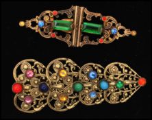 An early 1900s Czech filigree and glass stone belt buckle together with a similar age large Czech