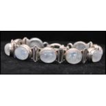 A vintage 925 silver moonstone cabochon bracelet with toggle clasp. Marked 925 tests silver.