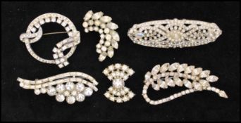 A collection of 1930s pot metal brooches set with rhinestones. x 6 Largest approx 2 1/2 inches,