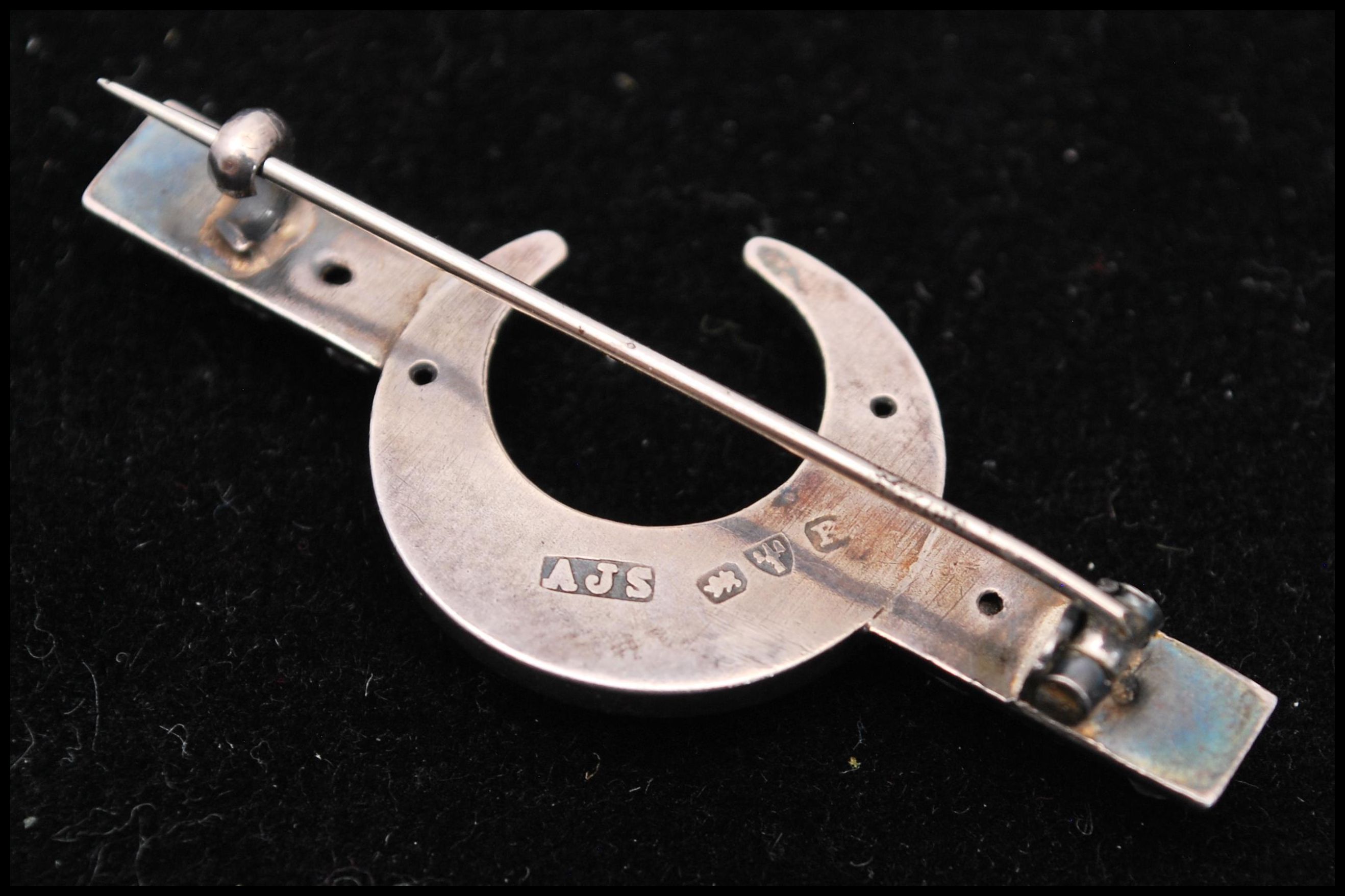 A hallmarked silver and paste brooch in the form of a crescent with c clasp. Hallmarked Chester, - Image 3 of 3