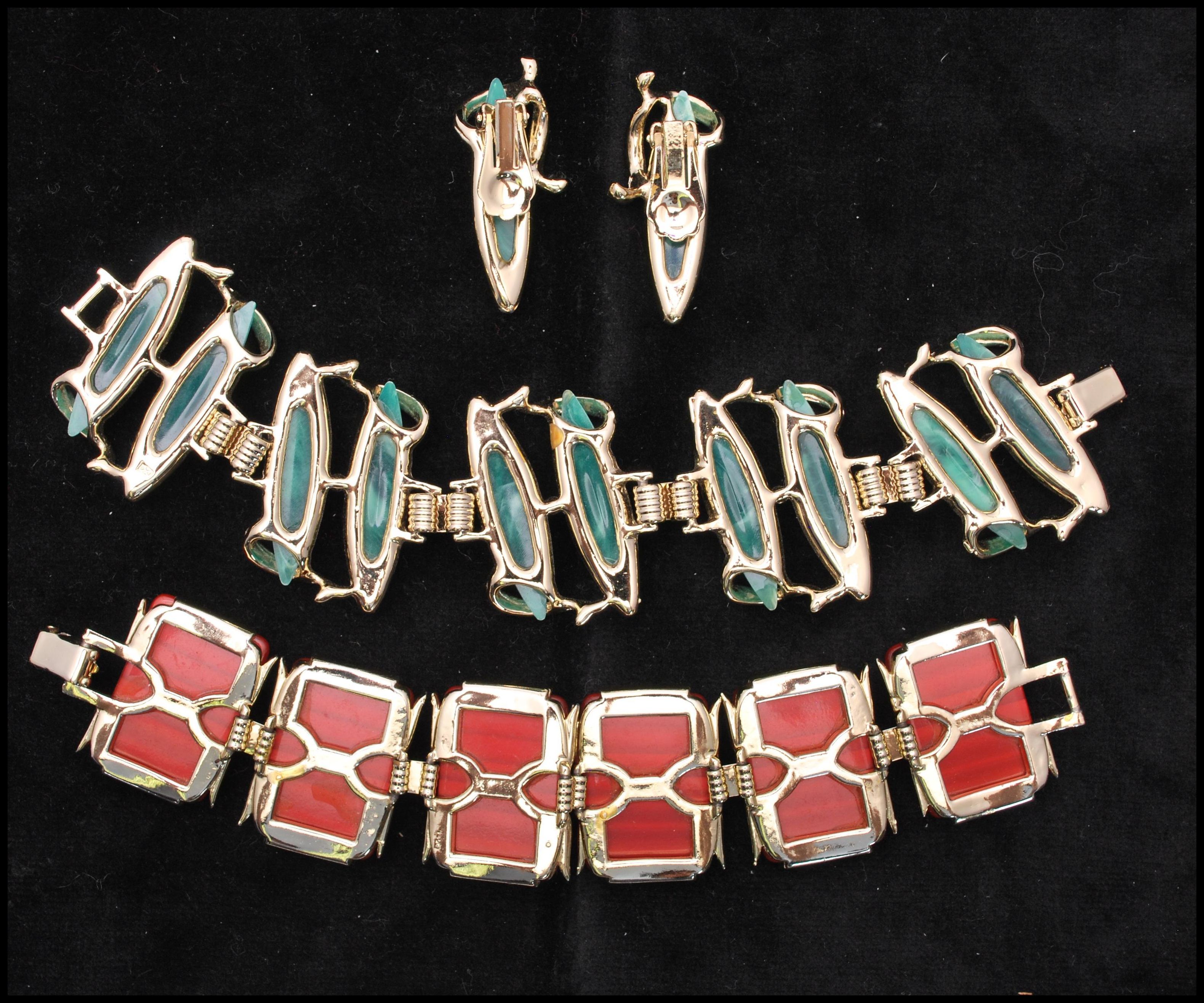 A 1950s gold-tone thermoset bracelet and earring set having green cabochons together with a 6 link - Image 2 of 2