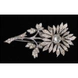 A 1950s signed Mitchel Maer for Christian Dior white metal flowerhead trembler brooch set with