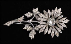 A 1950s signed Mitchel Maer for Christian Dior white metal flowerhead trembler brooch set with