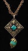 A 1920s Czech peaking glass and filigree work necklace together with a 1930s green and satin glass
