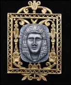 A vintage signed Art ©  Arthur Pepper gold-tone Egyptian revival pendant necklace with central