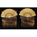 A pair of 1940s signed Miriam Haskell faux tortoiseshell hair combs with gold-tone fan decoration.