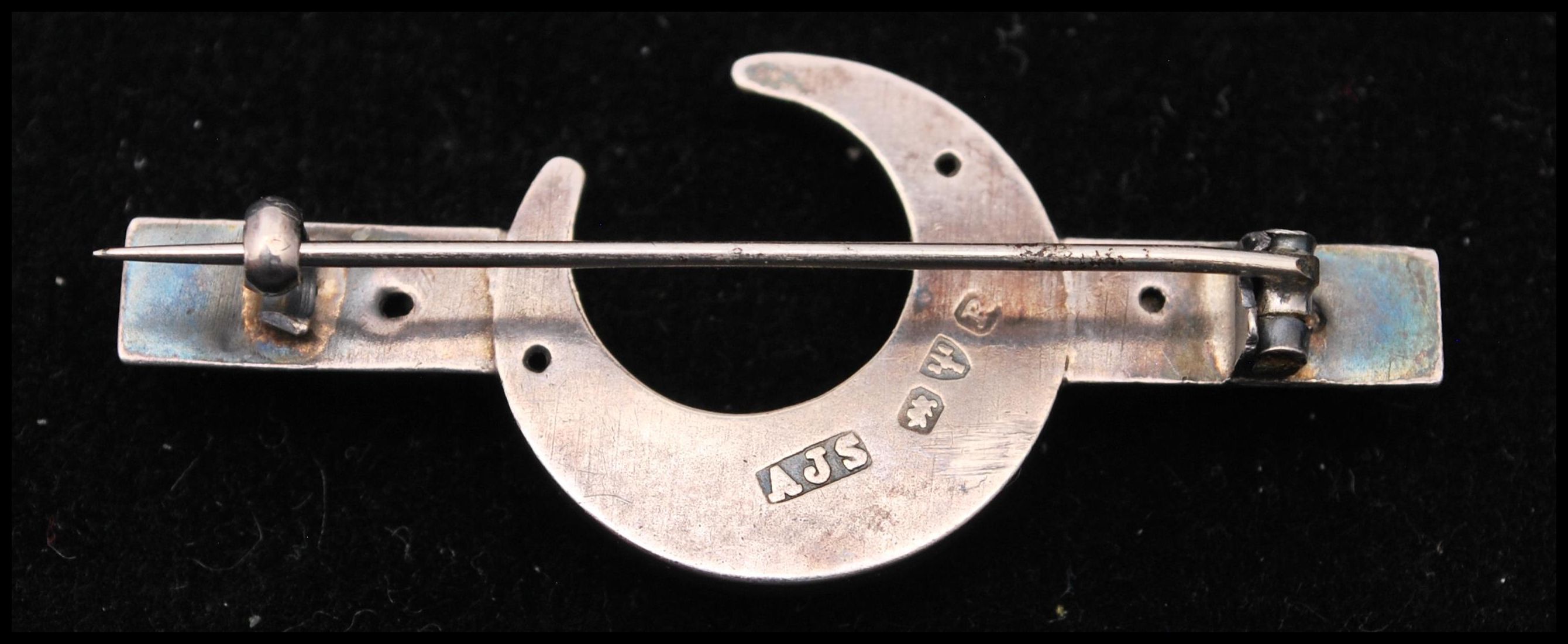 A hallmarked silver and paste brooch in the form of a crescent with c clasp. Hallmarked Chester, - Image 2 of 3