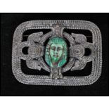 A 1950's silver tone Egyptian revival brooch set with a central Pharaoh. Measures 2 inches.