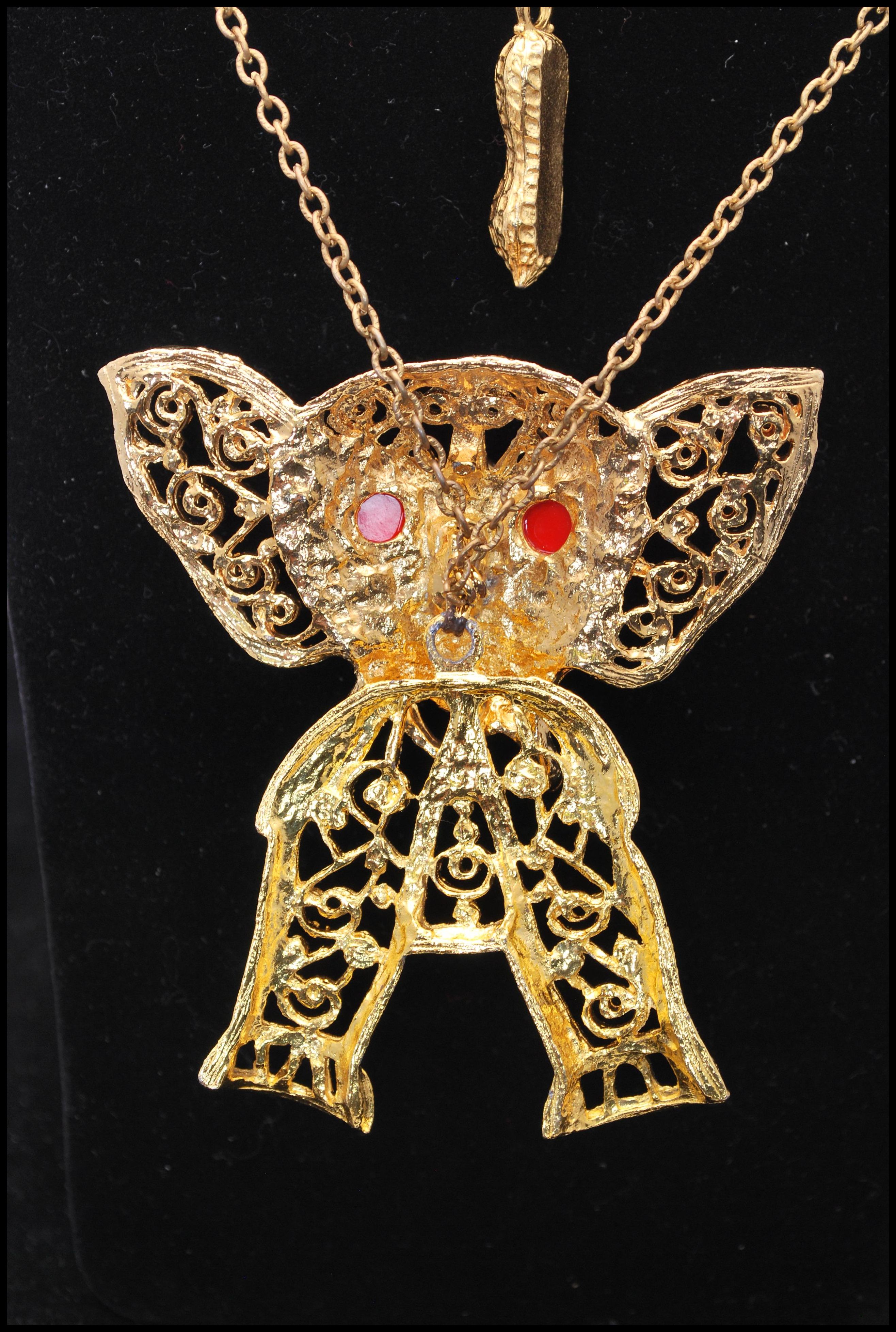 A vintage Delizza and Elster large articulated elephant pendant necklace having coral coloured - Image 5 of 6