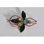 A 1940's sterling silver vermiel signed Coro bug brooch set with coloured rhinestones. Measures