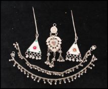 A collection of Indian silver white metal jewellery. x 5 Pendant measures 4 1/2 inches.