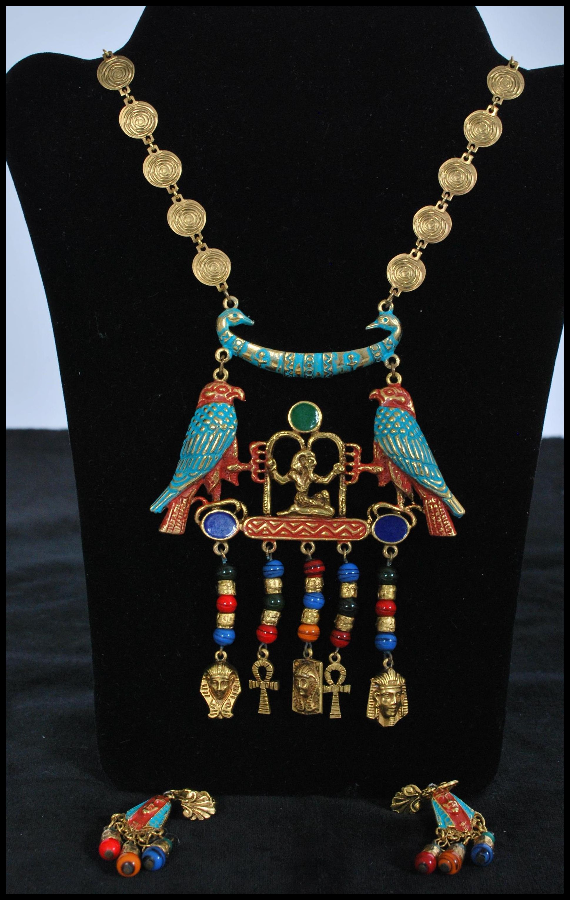 A 1960s signed Art Egyptian revival necklace and earring set by Arthur Pepper. Measures 18 inches