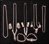 A quantity of rhinestone set jewellery to include necklace and earrings. Necklace measures 16