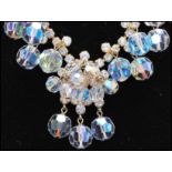 A 1960s DeLizza Elster Juliana AB crystal and rhinestone necklace. Unsigned puddling evident to