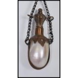 A Victorian French Mother of Pearl chatelaine stoppered perfume bottle with etched metal mounts
