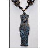 A 1930s Czech Neiger brothers Egyptian revival black glass filigree encased knotted bead sautoir