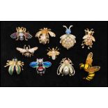 A collection of vintage bug brooches having enamel, rhinestone, ab rhinestone decorated styles, to