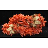 A vintage Frank Hess / Miriam Haskell spezzati coral coil bracelet having gold tone filigree and