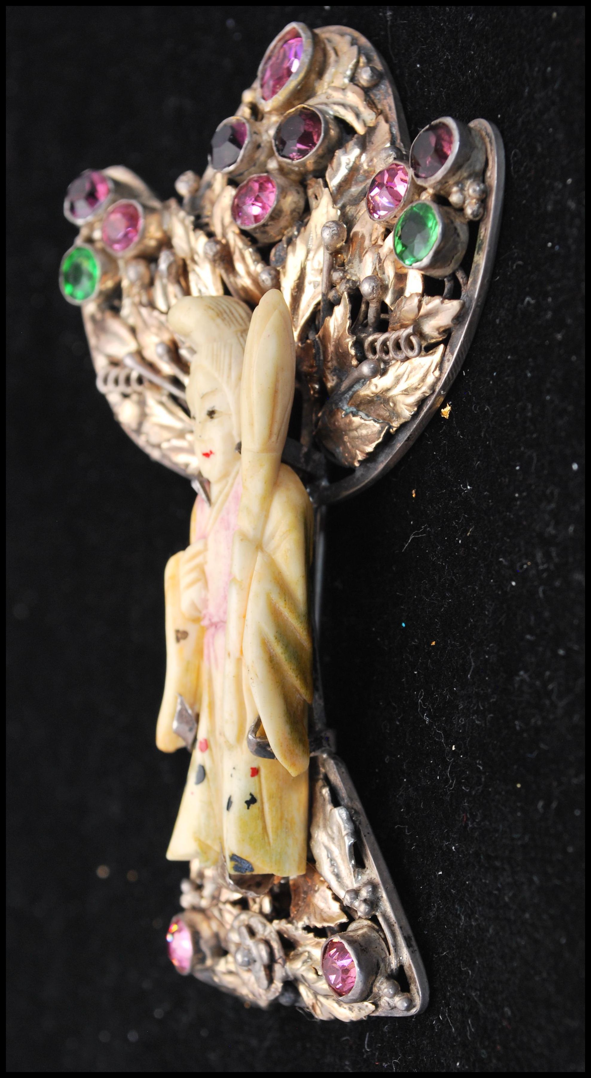 A 1940s Hobé Asian Lady brooch pin featuring a carved faux ivory Asian lady, wearing a tinted robe - Image 2 of 3