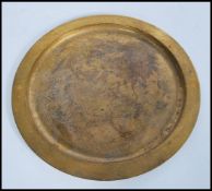 A vintage Tiffany Studios gilded bronze charger tr